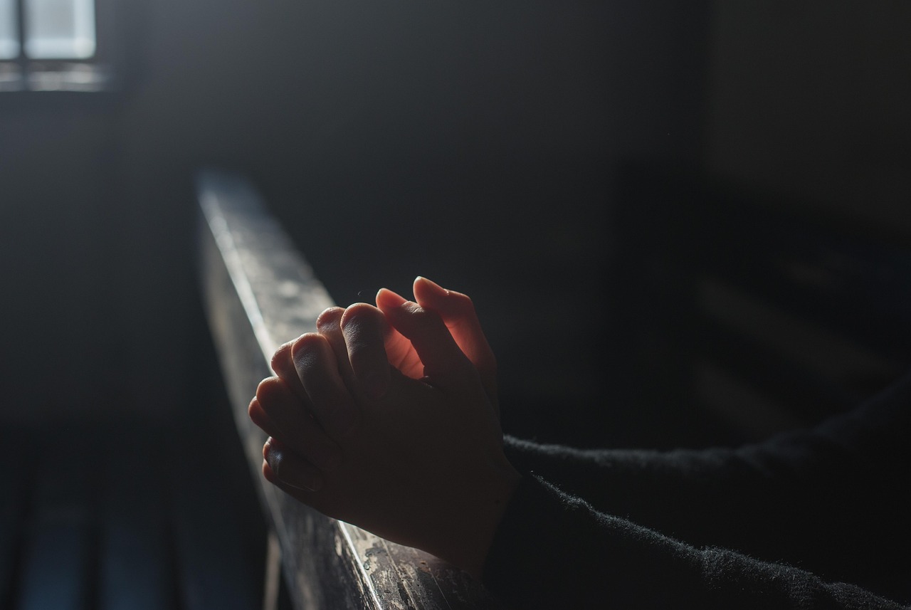 prayer hands church light